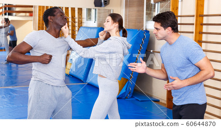 People fighting with coach at gym People fighting with coach at gym 60644870