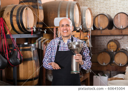 Seller in wine house 60645004