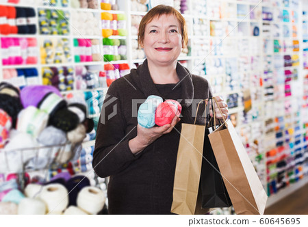 Woman with accessories for needlework Woman with accessories for needlework 60645695