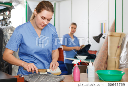 Portrait of young successful female worker Portrait of young successful female worker 60645769