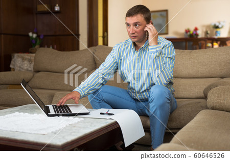 Man working with laptop Man working with laptop 60646526
