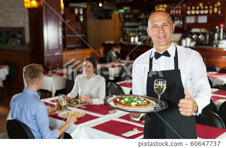 Waiter with serving tray Waiter with serving tray 60647737