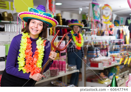 Portrait of smiling comically dressed girl Portrait of smiling comically dressed girl 60647744