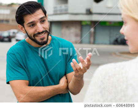 Man is acquaintancing with young woman 60648095