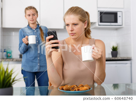 Portrait of woman drinking tea Portrait of woman drinking tea 60648740