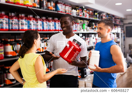 physically fit people discussing modern sport nutrition 60648827