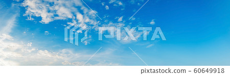 Panorama sky with cloud on a sunny day. Panorama sky with cloud on a sunny day. 60649918
