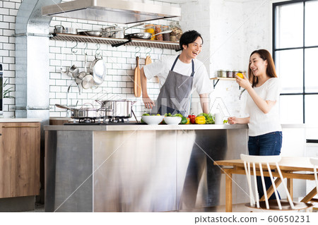 Married couple Family Couple Kitchen Lifestyle Married couple Family Couple Kitchen Lifestyle 60650231