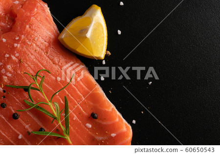 Raw salmon fish fillet background. Salmon steak Raw salmon fish fillet background. Salmon steak 60650543