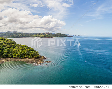 Aerial shot of the tropical beach Playa Arenillas in Costa Rica in peninsula Papagayo coast in guanacaste 60653237