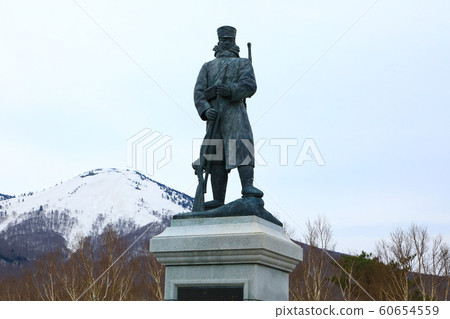 Memorial statue of martial corps distress in the snow 60654559