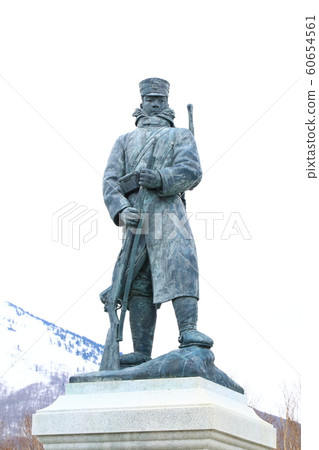 Memorial statue of martial corps distress in the snow 60654561