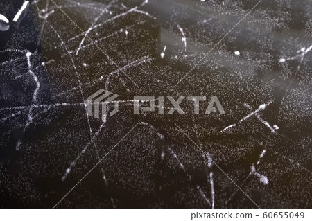 abstract grains background on glass table. White 60655049