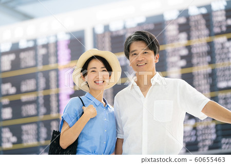 Travel airport couple married couple overseas travel Travel airport couple married couple overseas travel 60655463