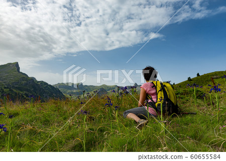 hiker woman resting in the mountain hiker woman resting in the mountain 60655584