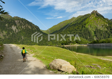 mature woman hiking in the Pyrenees mountains 60656970