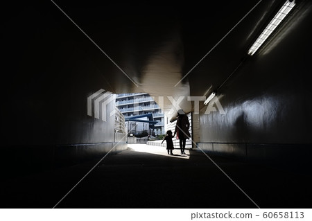 Tunnel parent and child silhouette 60658113