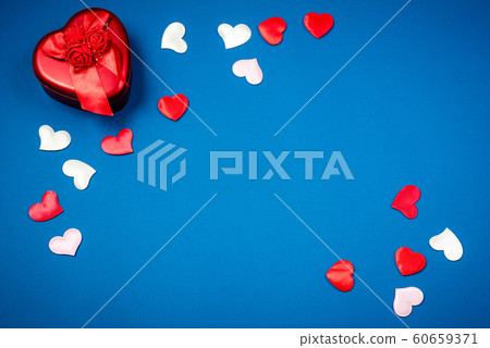 Red heart with a gift for Valentine's Day Red heart with a gift for Valentine's Day 60659371