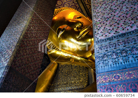 Grand Golden Reclining Buddha Statue in Main Hall of Wat Pho Temple, Bangkok, Thailand Grand Golden Reclining Buddha Statue in Main Hall of Wat Pho Temple, Bangkok, Thailand 60659734