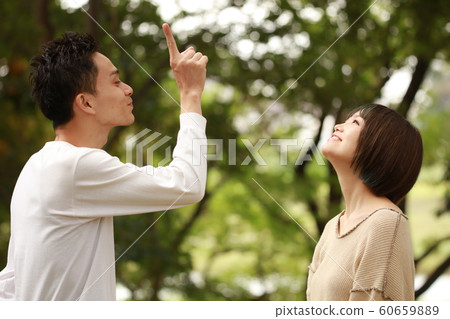 A couple playing around 60659889