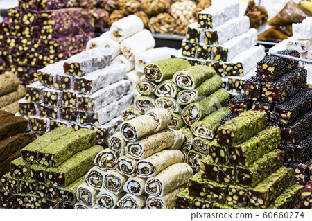 Background sweets baklava turkish delight nuts in the oriental market. Background sweets baklava turkish delight nuts in the oriental market. 60660274