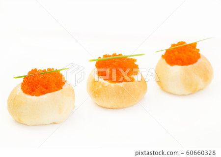 Mini snacks for buffet and banquet in a plastic bowl on a white background. 60660328