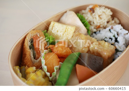 Two types of rice in a bento box Two types of rice in a bento box 60660415