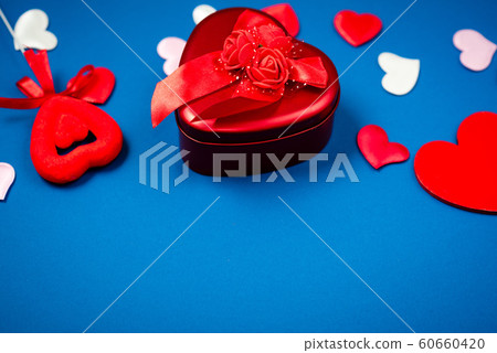 Red heart with a gift for Valentine's Day Red heart with a gift for Valentine's Day 60660420
