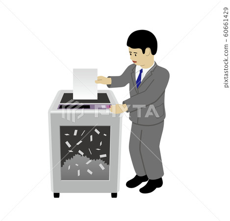 Businessman using a shredder Businessman using a shredder 60661429
