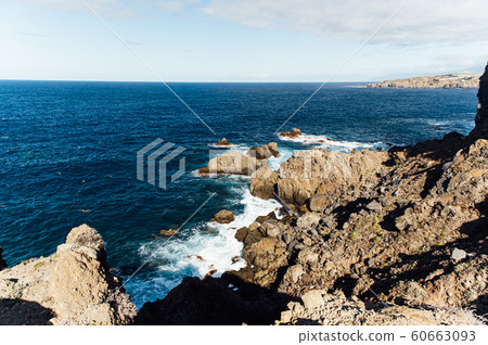 Breaking waves on the coast of Tenerife island, Canary islands, Atlantic ocean, Spain Breaking waves on the coast of Tenerife island, Canary islands, Atlantic ocean, Spain 60663093