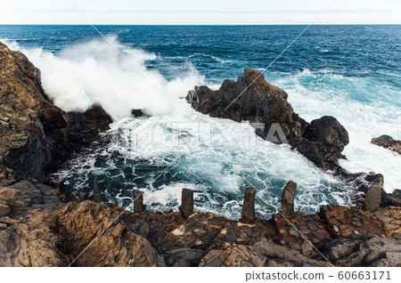 A powerful storm in the Atlantic Ocean in a bay on the coast of Tenerife. 60663171