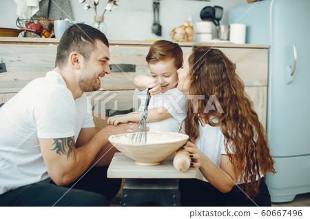 Family with little son in a kitchen 60667496