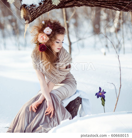 beautiful girl in the winter forest 60668015