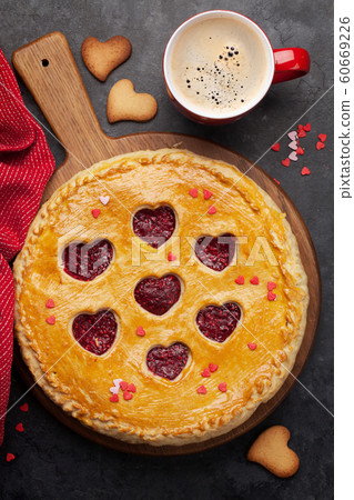 Raspberry cake for Valentine's Day with hearts Raspberry cake for Valentine's Day with hearts 60669226