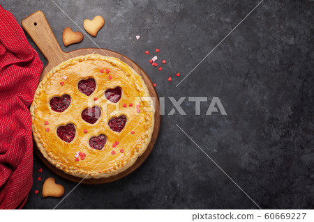 Raspberry cake for Valentine's Day with hearts Raspberry cake for Valentine's Day with hearts 60669227