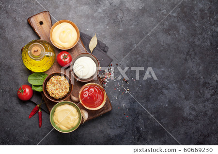 Set of various sauces. Popular sauces in bowls Set of various sauces. Popular sauces in bowls 60669230