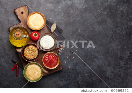Set of various sauces. Popular sauces in bowls Set of various sauces. Popular sauces in bowls 60669231