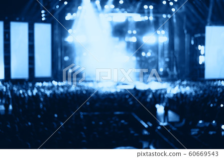 Blurred people crowd at musical concert and stage lights. Blurred people crowd at musical concert and stage lights. 60669543