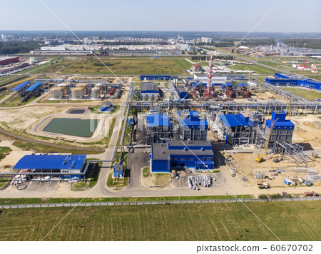 Plant for the production of liquefied natural gas. Construction of a factory for pumping liquefied gas. Aerial shooting with a drone. 60670702