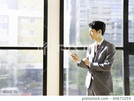 Businessman smartphone Businessman smartphone 60671059