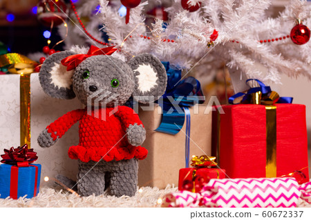 Plush mouse together with gifts under the 60672337