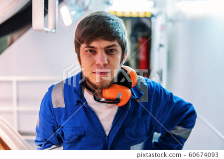 Marine engineer works on the ship. Seamen's work Marine engineer works on the ship. Seamen's work 60674093