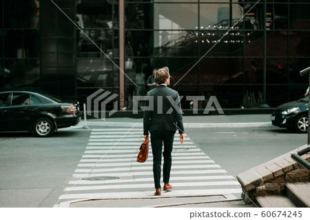 The Businessman Crossing The Road The Businessman Crossing The Road 60674245