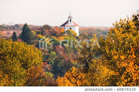 Autumn Forest Landscape with White Chapel on the Autumn Forest Landscape with White Chapel on the 60674319