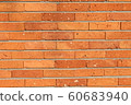 A red brick wall that is great for use as a background. 60683940
