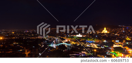 Amazing night panoramic cityscape of Georgian Capital old town, Tbilisi. Amazing night panoramic cityscape of Georgian Capital old town, Tbilisi. 60689753