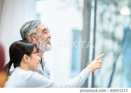 Senior man and daughter Senior man and daughter 60691215