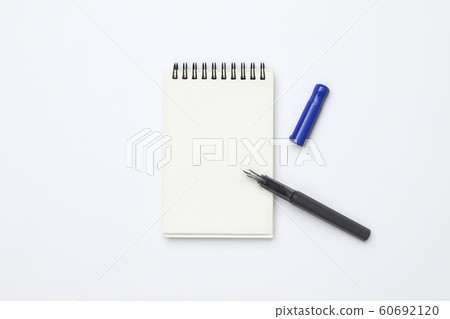 Blank notepad and pen / stationery 60692120