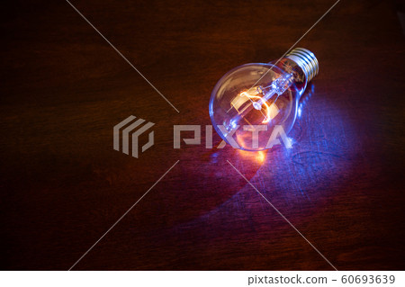 light bulb on dark background light bulb on dark background 60693639