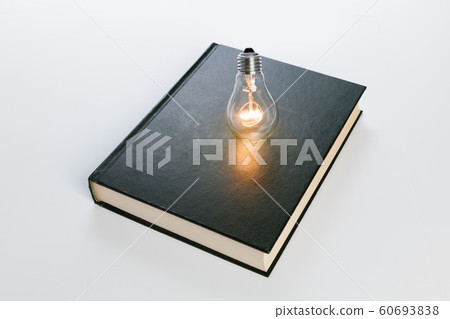 book and light bulb 60693838